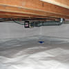A heating duct extends along this sealed crawl space in Coquitlam.