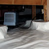 An energy efficient crawl space dehumidifier installed in a sealed crawl space in Delta.