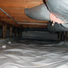 A sealed crawl space with an insulated hot air duct in Langley.