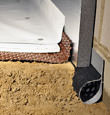Delta installation of SilverGlo™ insulation with our crawl space pipe, drainage matting, floor insulation, and crawl space moisture barrier.