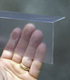 Closeup of a clear plastic covering on a Mission crawl space block wall