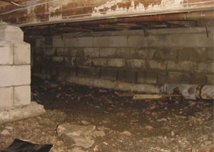 Rotting, decaying crawl space wood damaged over time in Deep Cove