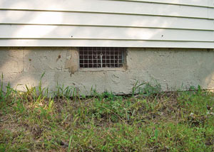 Open crawl space vents that let rodents, termites, and other pests in a home in Delta