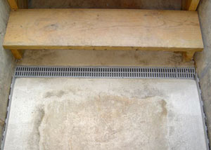 Our grated drain system installed on a leaking basement staircase in Becarra.