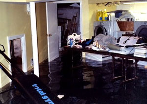 A laundry room flood in West Vancouver, with several feet of water flooded in.