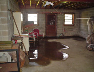 a flooded basement floor in a Anmore home