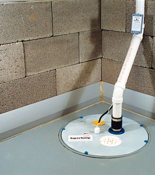 A baseboard basement drain pipe system installed in Mission