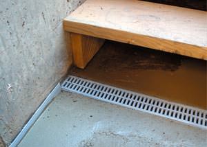 a hatchway entrance in White Rock that has been protected from flooding by our TrenchDrain basement drainage system.