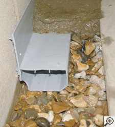 A no-clog basement french drain system installed in Abbotsford