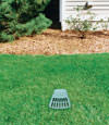 A buried gutter drain downspout extension installed in a Anmore home
