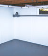 Langley, BC wet basement wall covering that tucks into a perimeter drainage system
