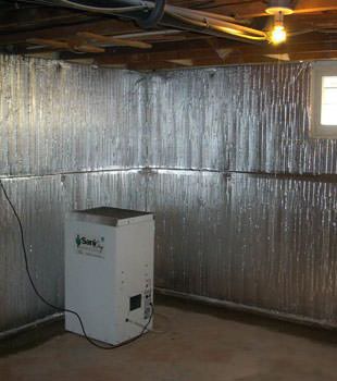 Radiant heat barrier system for unfinished basement walls
